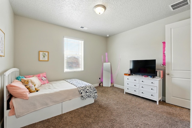 4529 Skyline Loop NE, Rio Rancho, NM 87144 - carpeted bedroom with a textured ceiling and baseboards