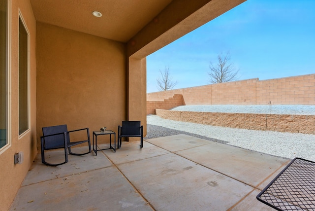 4529 Skyline Loop NE, Rio Rancho, NM 87144 - fenced backyard with a patio