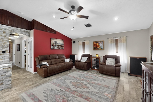 9616 Eucariz Ave SW, Albuquerque, NM 87121 - living room featuring ceiling fan, lofted ceiling, wood tiled floors, recessed lighting, and arched walkways
