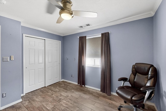 9616 Eucariz Ave SW, Albuquerque, NM 87121 - sitting room with crown molding, ceiling fan, and wood finished floors