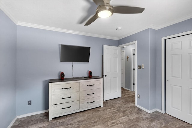 9616 Eucariz Ave SW, Albuquerque, NM 87121 - bedroom featuring crown molding, wood finished floors, and a ceiling fan