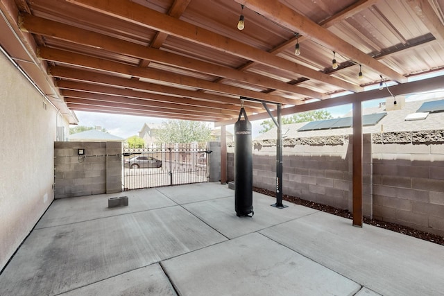 9616 Eucariz Ave SW, Albuquerque, NM 87121 - fenced backyard with a patio area