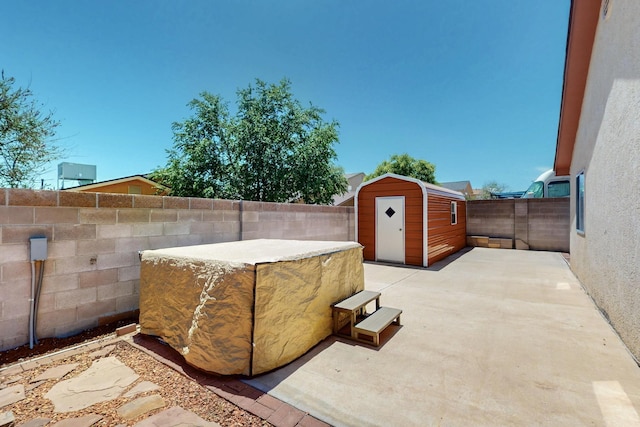 9616 Eucariz Ave SW, Albuquerque, NM 87121 - fenced backyard featuring a storage unit and a patio area