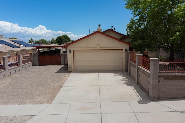 9616 Eucariz Ave SW, Albuquerque, NM 87121 - single story home featuring stucco siding, concrete driveway, and a gate