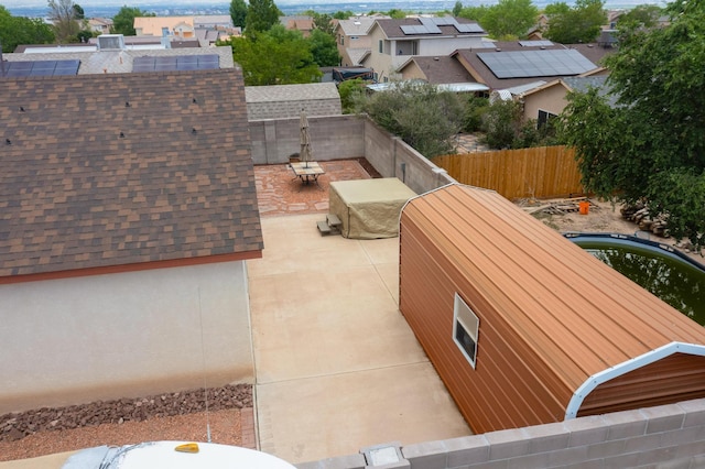 9616 Eucariz Ave SW, Albuquerque, NM 87121 - fenced backyard with a patio and a residential view