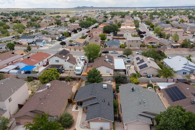 9616 Eucariz Ave SW, Albuquerque, NM 87121 - aerial perspective of suburban area with a mountain backdrop