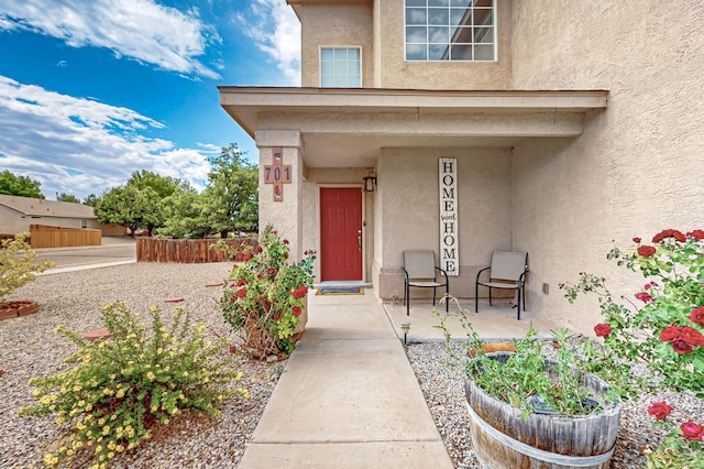 701 Autumn Meadows Dr, Rio Rancho, NM 87144 - view of exterior entry with stucco siding