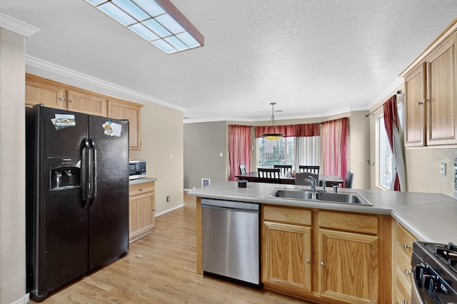 701 Autumn Meadows Dr, Rio Rancho, NM 87144 - kitchen featuring appliances with stainless steel finishes, a peninsula, light wood finished floors, crown molding, and hanging light fixtures