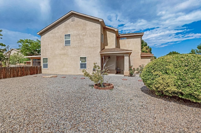 701 Autumn Meadows Dr, Rio Rancho, NM 87144 - rear view of property featuring stucco siding