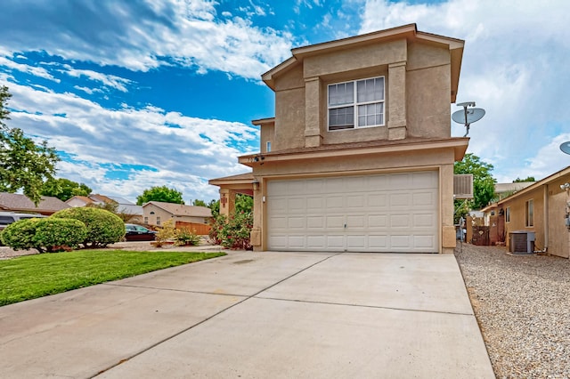 701 Autumn Meadows Dr, Rio Rancho, NM 87144 - traditional home with concrete driveway, a garage, stucco siding, and a front lawn