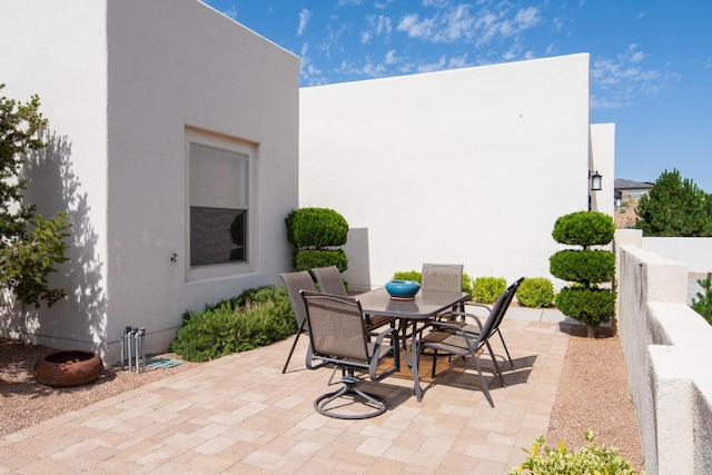 1978 Castle Peak Loop NE, Rio Rancho, NM 87144 - view of patio / terrace with outdoor dining space