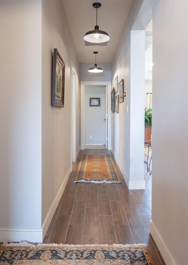 1978 Castle Peak Loop NE, Rio Rancho, NM 87144 - hallway featuring wood tiled floors and baseboards