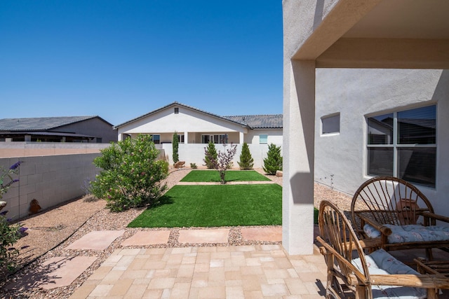 1978 Castle Peak Loop NE, Rio Rancho, NM 87144 - fenced backyard with a patio area