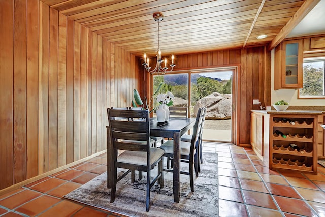 1036 Red Oaks Loop NE, Albuquerque, NM 87122 - tiled dining room featuring wood ceiling, healthy amount of natural light, wood walls, and a chandelier