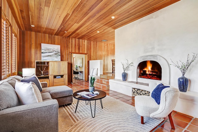 1036 Red Oaks Loop NE, Albuquerque, NM 87122 - tiled living area featuring wood walls, recessed lighting, a high end fireplace, and wood ceiling