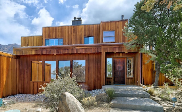 1036 Red Oaks Loop NE, Albuquerque, NM 87122 - rear view of property featuring a chimney