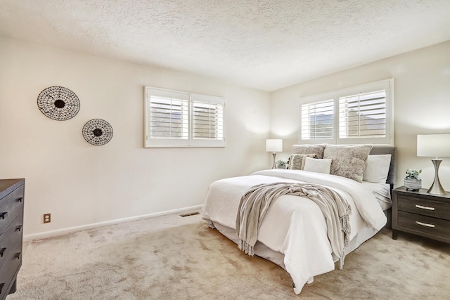 1036 Red Oaks Loop NE, Albuquerque, NM 87122 - bedroom featuring light carpet and a textured ceiling