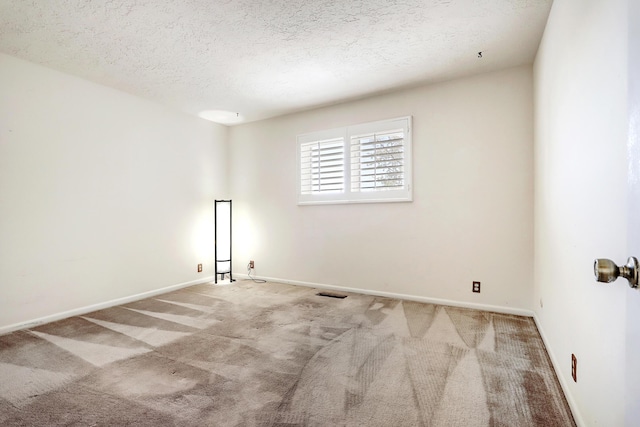 1036 Red Oaks Loop NE, Albuquerque, NM 87122 - empty room featuring carpet and a textured ceiling