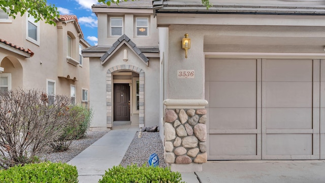 3536 Clear Creek Pl, Rio Rancho, NM 87144 - property entrance featuring a garage and stucco siding