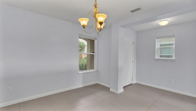 3536 Clear Creek Pl, Rio Rancho, NM 87144 - unfurnished dining area with tile patterned flooring and a chandelier