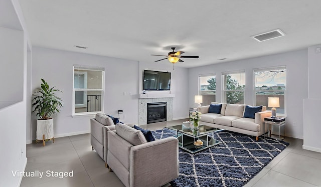 3536 Clear Creek Pl, Rio Rancho, NM 87144 - tiled living room with a fireplace and ceiling fan