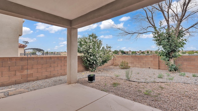 3536 Clear Creek Pl, Rio Rancho, NM 87144 - fenced backyard featuring a patio area