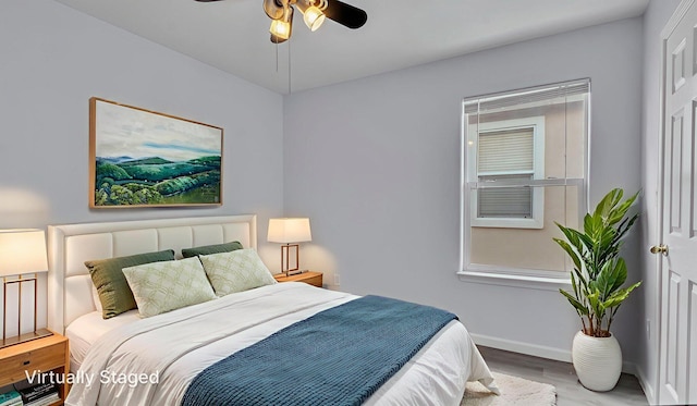 3536 Clear Creek Pl, Rio Rancho, NM 87144 - bedroom featuring wood finished floors and ceiling fan