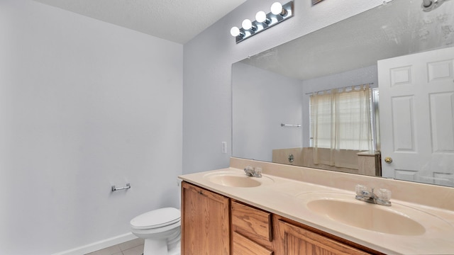 3536 Clear Creek Pl, Rio Rancho, NM 87144 - bathroom with double vanity, tile patterned floors, and a textured ceiling