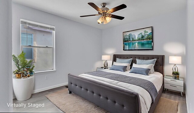 3536 Clear Creek Pl, Rio Rancho, NM 87144 - bedroom featuring wood finished floors and a ceiling fan