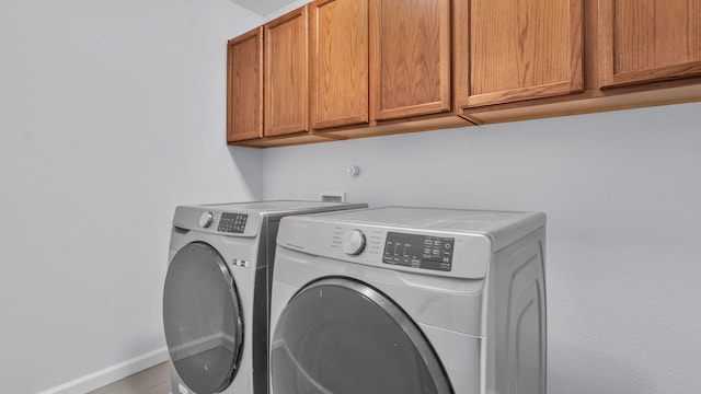 3536 Clear Creek Pl, Rio Rancho, NM 87144 - laundry area featuring cabinet space and washer and clothes dryer