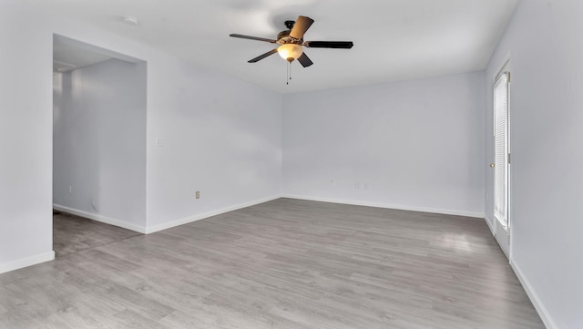 3536 Clear Creek Pl, Rio Rancho, NM 87144 - spare room featuring a ceiling fan, wood finished floors, and a smoke detector