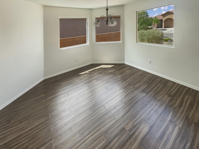 1225 La Fonda St, Bernalillo, NM 87004 - empty room featuring a chandelier and dark wood finished floors