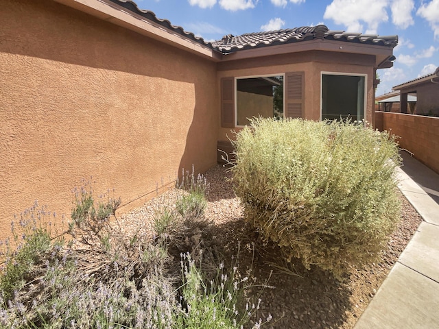 1225 La Fonda St, Bernalillo, NM 87004 - view of home's exterior featuring stucco siding and a tile roof