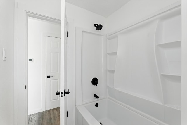9638 Morrow Ave NE, Albuquerque, NM 87112 - full bath with wood finished floors and washtub / shower combination