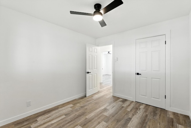 9638 Morrow Ave NE, Albuquerque, NM 87112 - unfurnished bedroom featuring light wood-style flooring and a ceiling fan