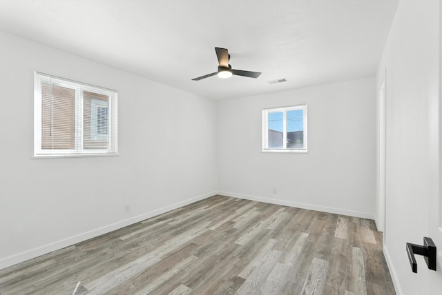 9638 Morrow Ave NE, Albuquerque, NM 87112 - spare room with ceiling fan and light wood-style flooring
