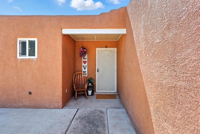 120 Itasca Rd SE, Rio Rancho, NM 87124 - entrance to property featuring stucco siding