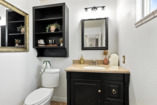 120 Itasca Rd SE, Rio Rancho, NM 87124 - bathroom with toilet and vanity