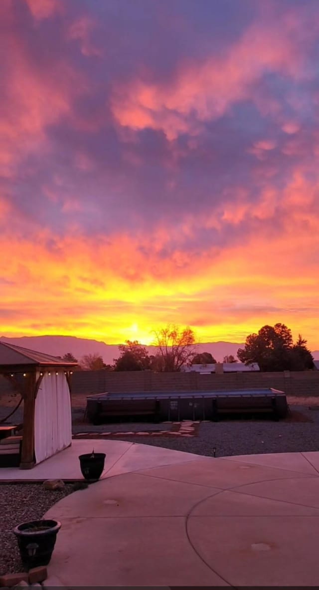 120 Itasca Rd SE, Rio Rancho, NM 87124 - view of patio terrace at dusk