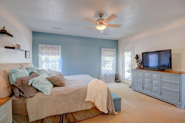 2 Partridge Ct, Peralta, NM 87042 - bedroom with light carpet, access to outside, and a ceiling fan