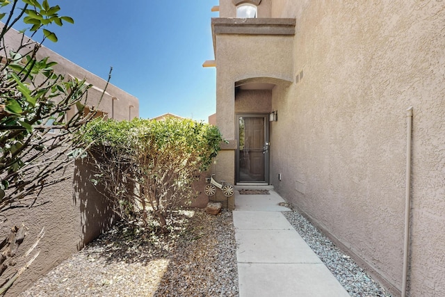 1969 Cortina Loop SE, Albuquerque, NM 87124 - doorway to property with stucco siding