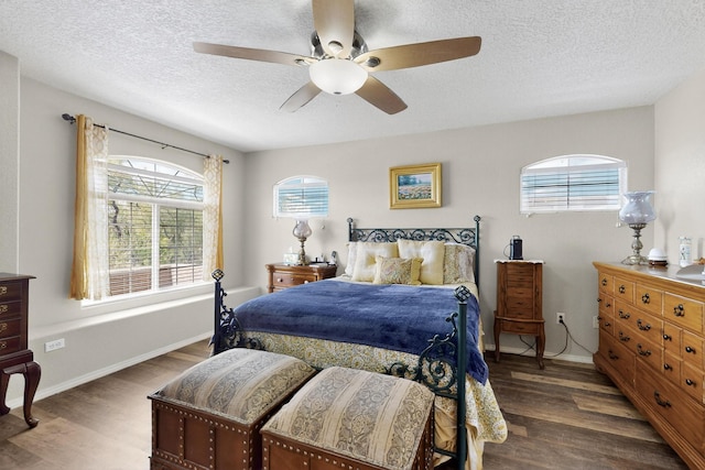 1969 Cortina Loop SE, Albuquerque, NM 87124 - bedroom featuring wood finished floors, a textured ceiling, and ceiling fan