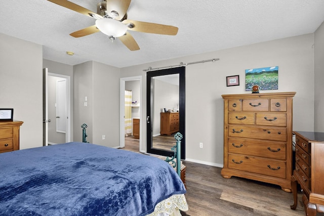 1969 Cortina Loop SE, Albuquerque, NM 87124 - bedroom with wood finished floors, a textured ceiling, ceiling fan, and connected bathroom
