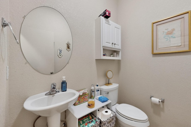 1969 Cortina Loop SE, Albuquerque, NM 87124 - half bath featuring toilet and a sink