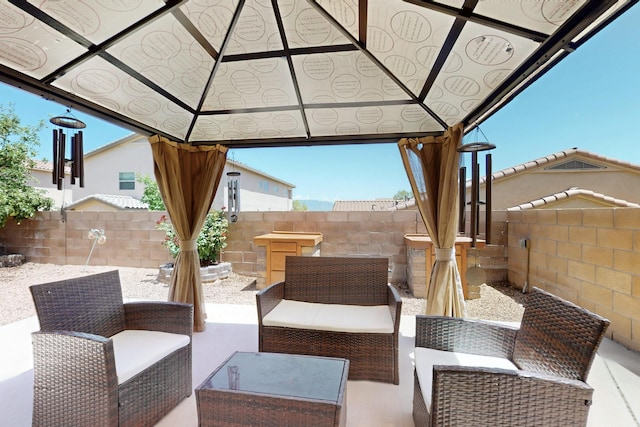 1969 Cortina Loop SE, Albuquerque, NM 87124 - fenced backyard with a gazebo, outdoor lounge area, and a patio area