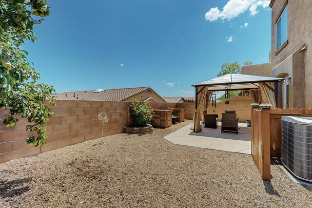 1969 Cortina Loop SE, Albuquerque, NM 87124 - fenced backyard featuring a gazebo and a patio