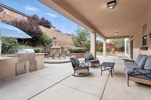 43 Vista Larga Pl NE, Rio Rancho, NM 87124 - view of patio featuring an outdoor hangout area, area for grilling, and outdoor dining space