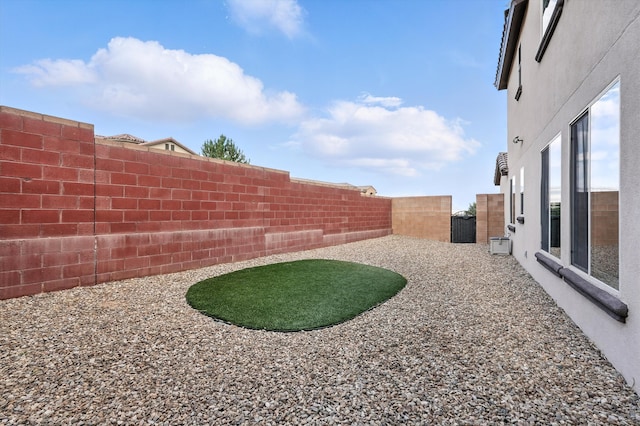 43 Vista Larga Pl NE, Rio Rancho, NM 87124 - fenced backyard with a gate