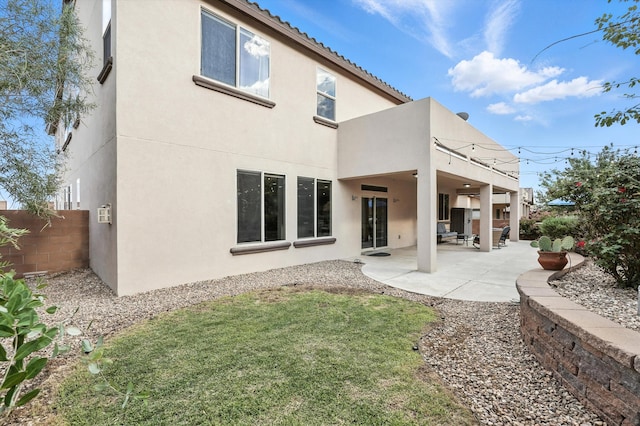 43 Vista Larga Pl NE, Rio Rancho, NM 87124 - rear view of property with stucco siding, a patio area, a tiled roof, and a balcony