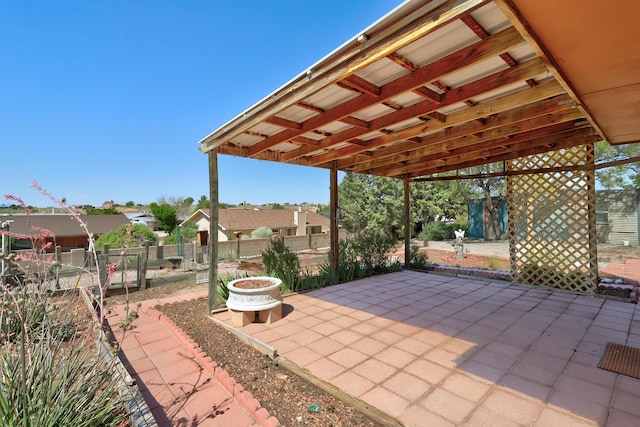 6054 Jack Rabbit Rd NE, Rio Rancho, NM 87144 - view of patio featuring a residential view